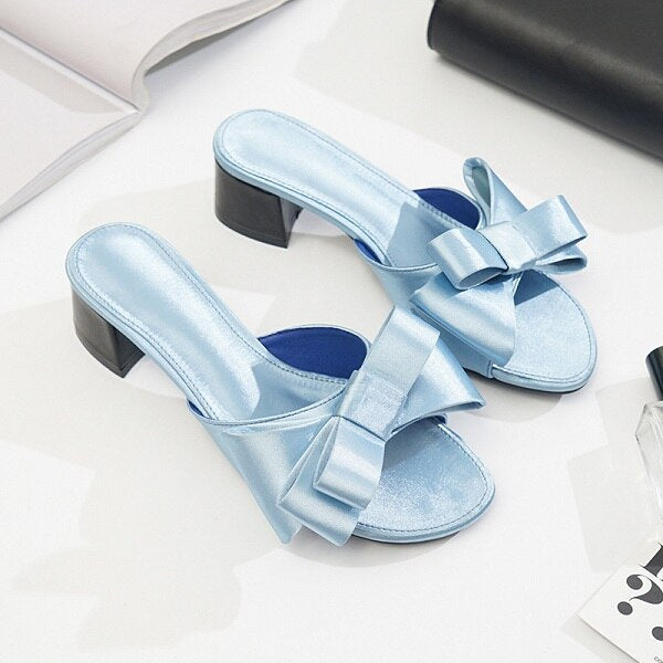 Wearing flat slippers women's shoes Korean version of the summer new large bow satin round head sandals Wild half slippers