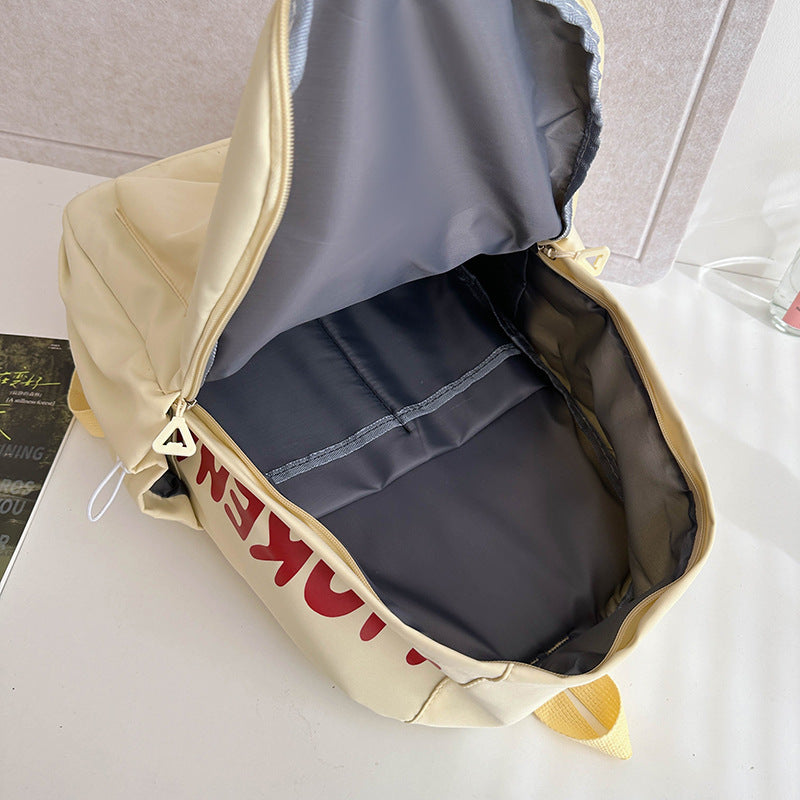2025 Japanese simple and versatile backpack large capacity solid color campus schoolbag light commuter college student design backpack