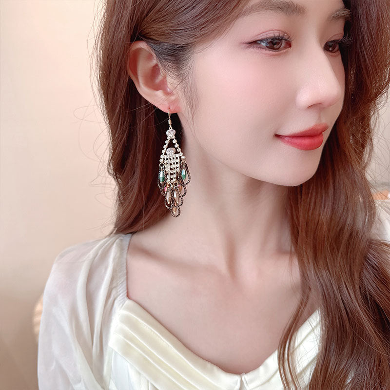 2025 Retro ethnic style exaggerated earrings long female temperament bohemian elegance water drop fringed feather earrings