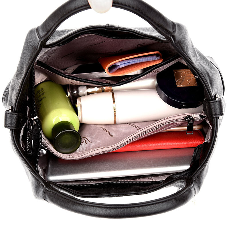 2025 bags popular autumn new high-end soft leather handbags with simple temperament middle-aged mother bags wholesale