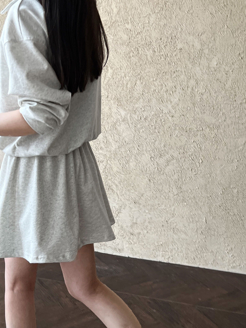 Luxi, Korean age-reducing suit for women's spring new fake two-piece sweater + elastic skirt two-piece set 2884