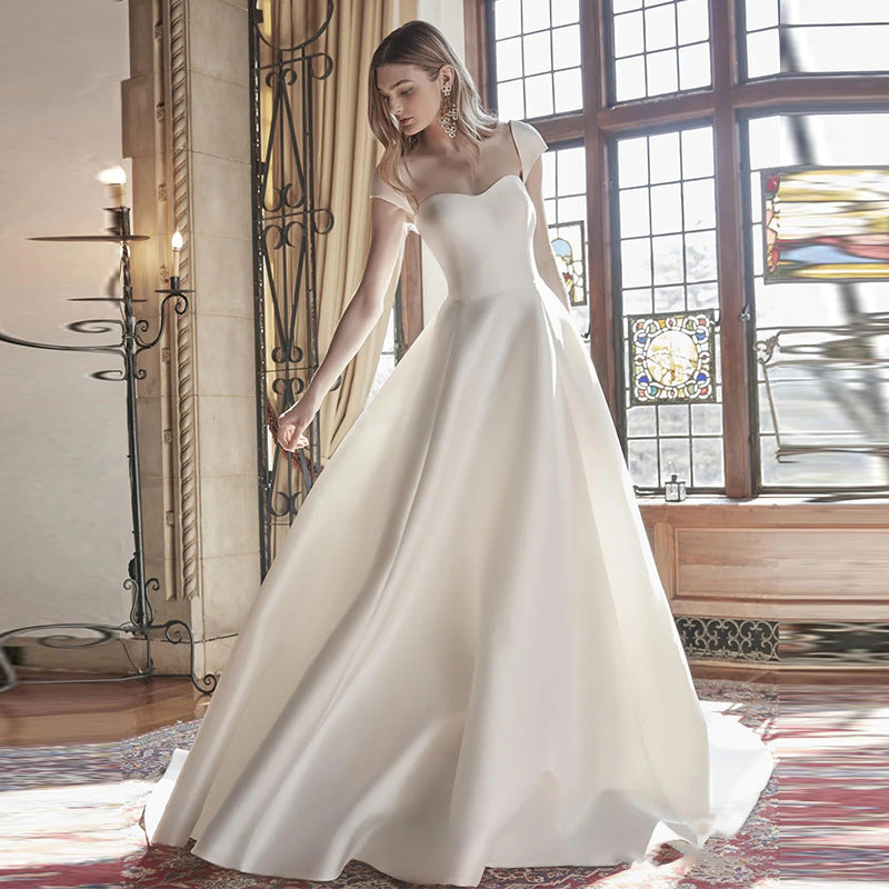 2025 retro light wedding dress new tube top one-word shoulder out yarn temperament satin white evening dress skirt women