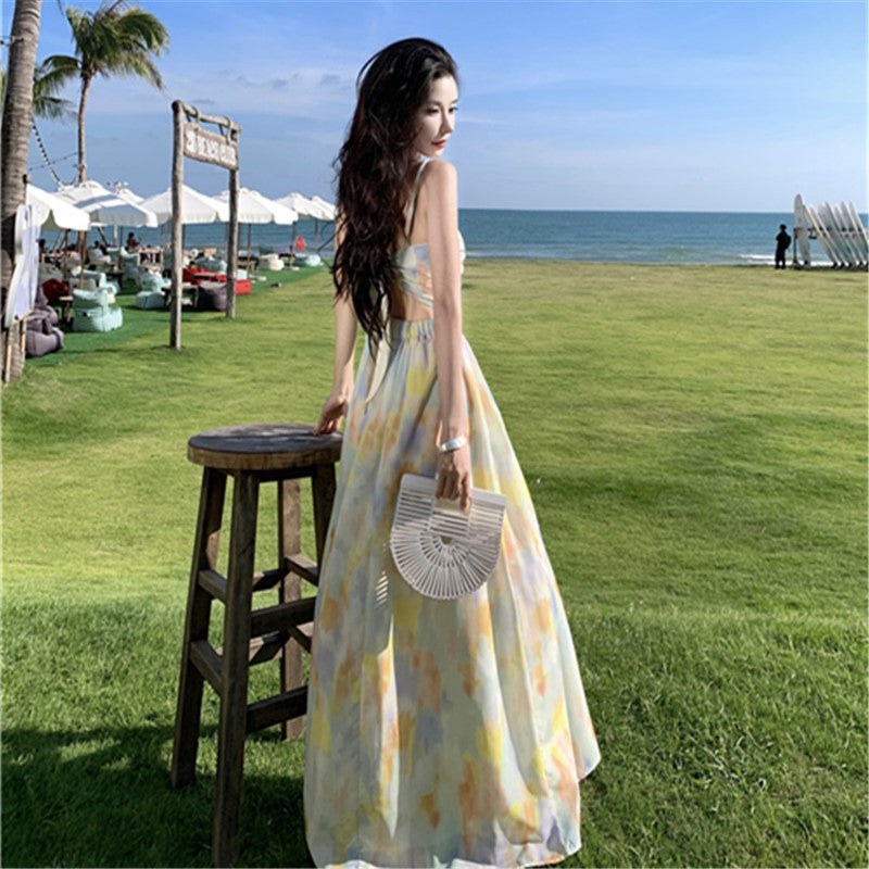 2025 Pure desire sexy backless floral suspender dress women's summer niche pleated straps seaside vacation beach dress