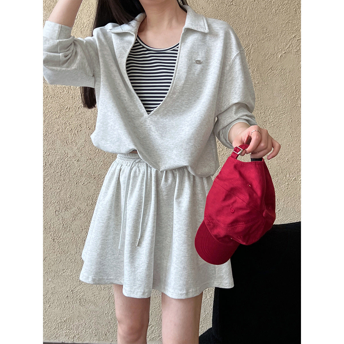 Luxi, Korean age-reducing suit for women's spring new fake two-piece sweater + elastic skirt two-piece set 2884