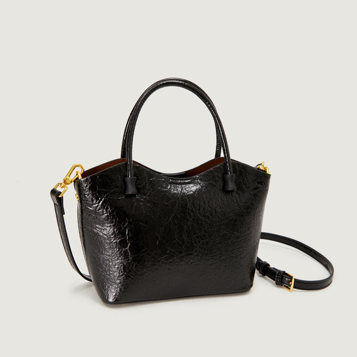 2025 Bag autumn women's popular new simple and fashionable handbag versatile glossy high-end women's bag niche messenger bag