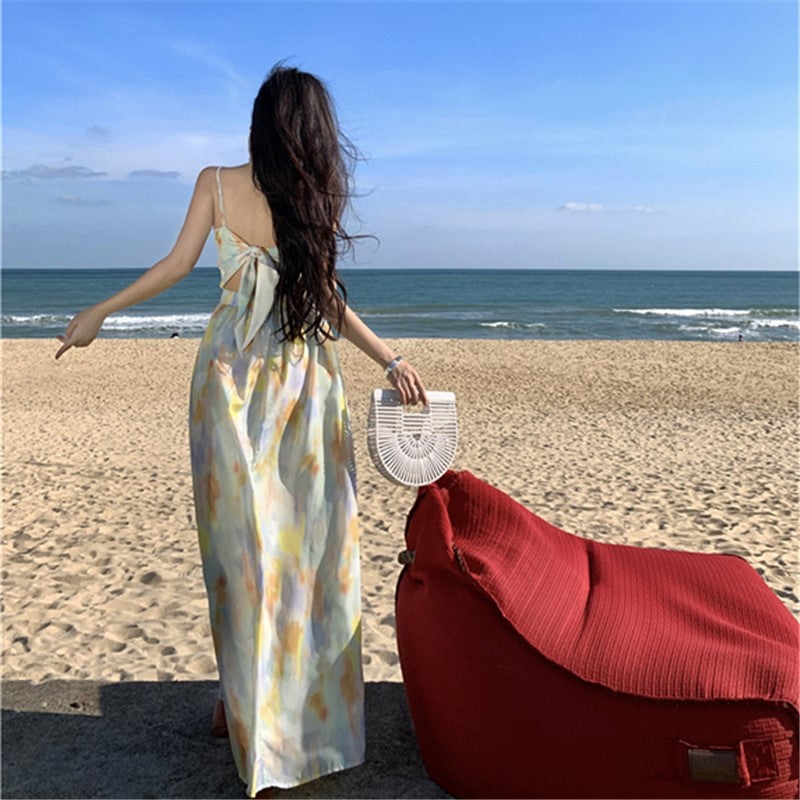 2025 Pure desire sexy backless floral suspender dress women's summer niche pleated straps seaside vacation beach dress
