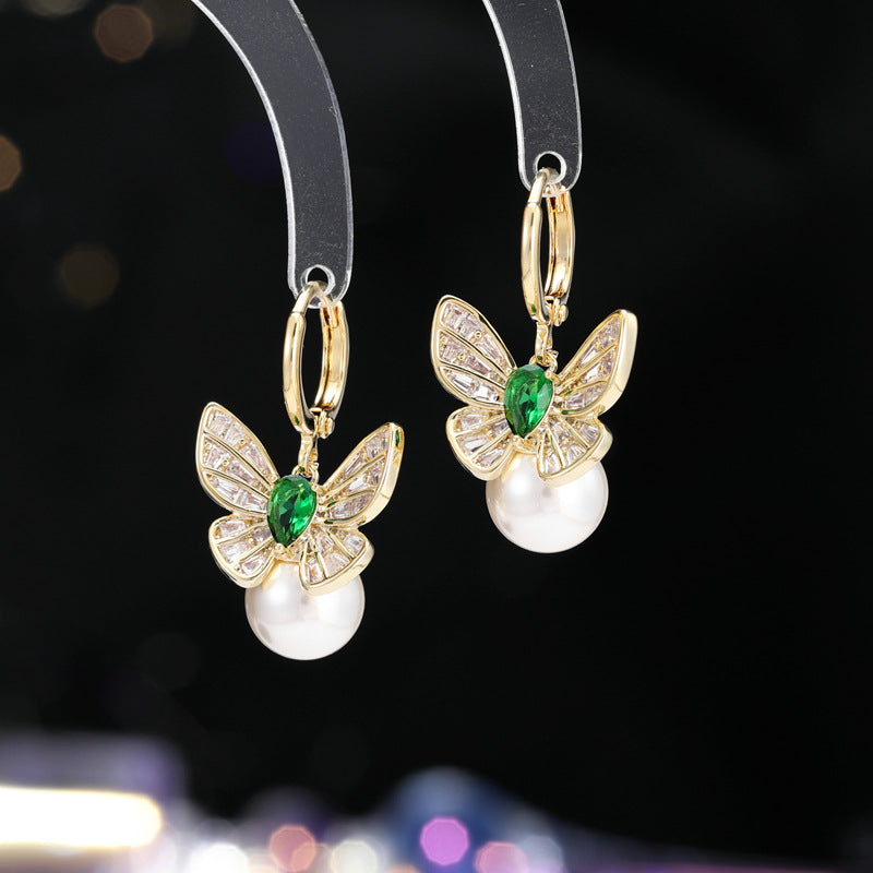 2025 fashion light luxury retro earrings slightly inlaid zircon personality versatile high-end earrings female butterfly pearl ear buckle