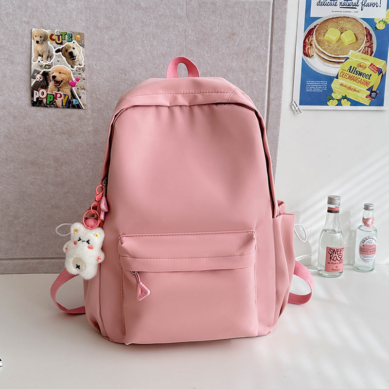 2025 Japanese simple and versatile backpack large capacity solid color campus schoolbag light commuter college student design backpack