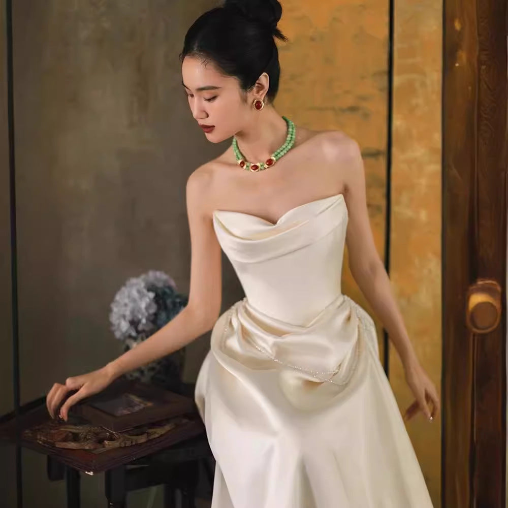 2025 one-word shoulder light wedding dress bride simple going out dress high-end temperament small trailing white satin dress skirt