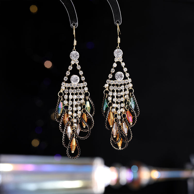 2025 Retro ethnic style exaggerated earrings long female temperament bohemian elegance water drop fringed feather earrings
