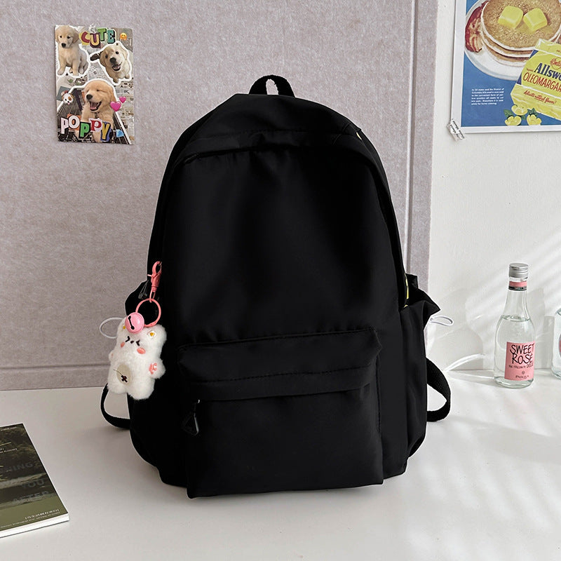 2025 Japanese simple and versatile backpack large capacity solid color campus schoolbag light commuter college student design backpack