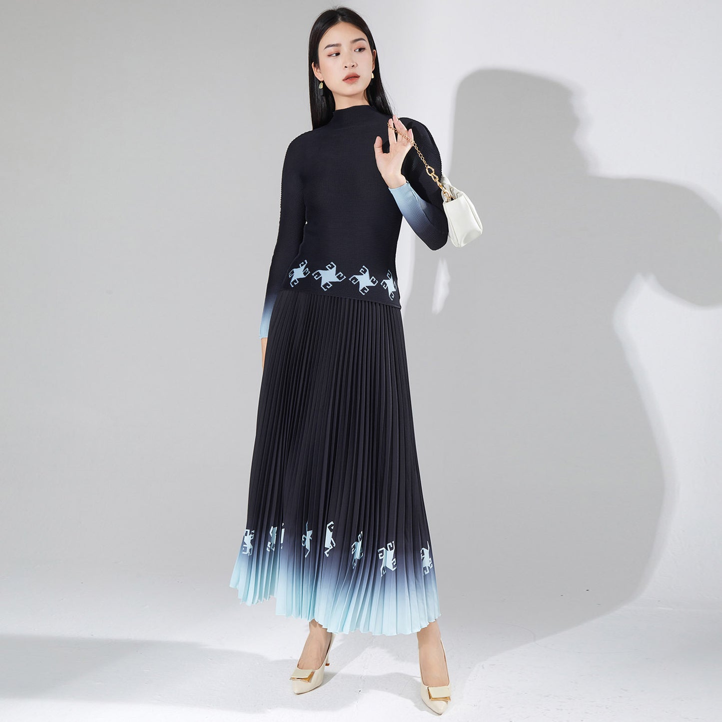2025 Pleated suit women's fashion two-piece set spring and summer new printed slim-fit top pendant versatile skirt