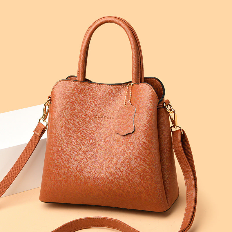 2025 Handbag spring fashionable simple bag multi-compartment large-capacity women's tote bag Korean version of the new commuter satchel