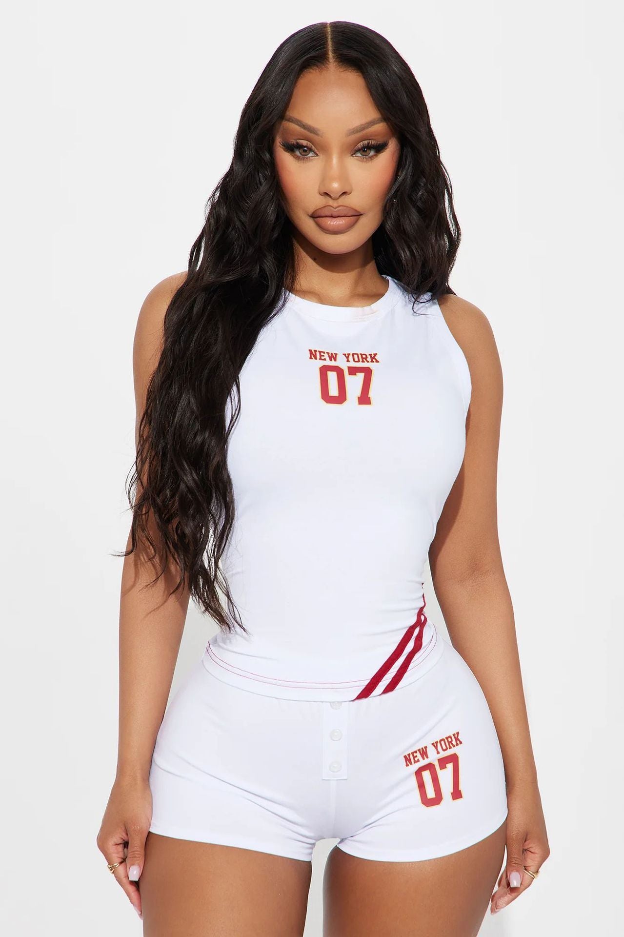 In the summer of , Popular, and other New Popular trade open-navel short alphanumeric printed vest waist-length shorts set
