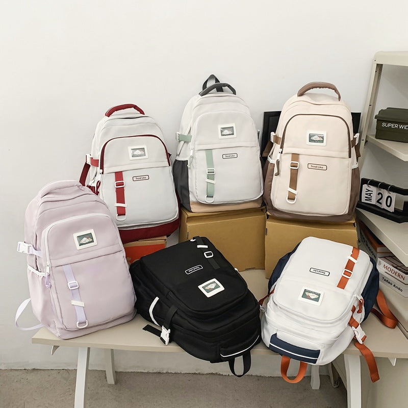2025 School bag female high school student large capacity school bag casual backpack Korean version simple college student school bag female