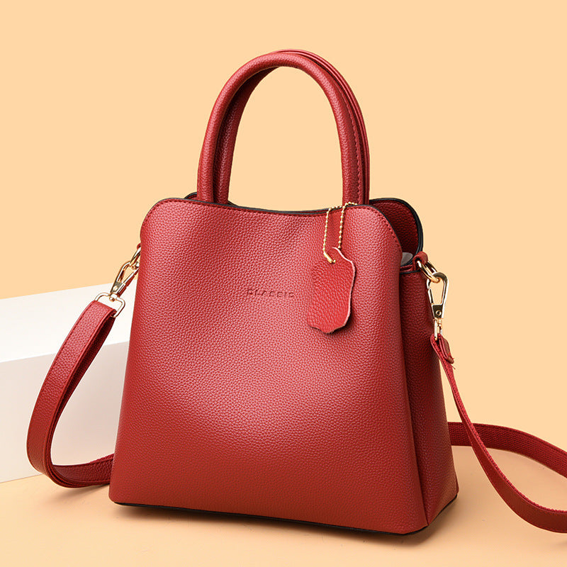 2025 Handbag spring fashionable simple bag multi-compartment large-capacity women's tote bag Korean version of the new commuter satchel