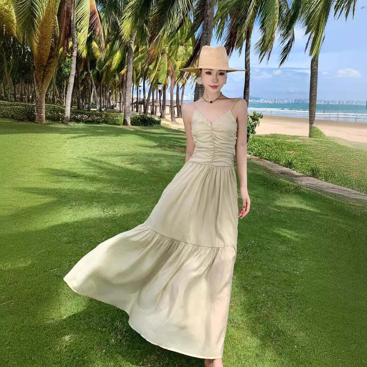 2025 Photo skirt Yunnan Xishuangbanna Dali long dress women's V-neck Hainan beach backless strap suspender dress