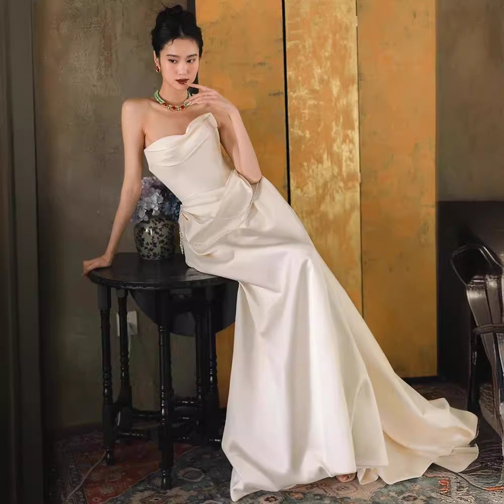2025 one-word shoulder light wedding dress bride simple going out dress high-end temperament small trailing white satin dress skirt