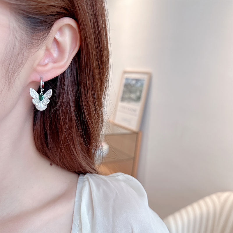 2025 fashion light luxury retro earrings slightly inlaid zircon personality versatile high-end earrings female butterfly pearl ear buckle