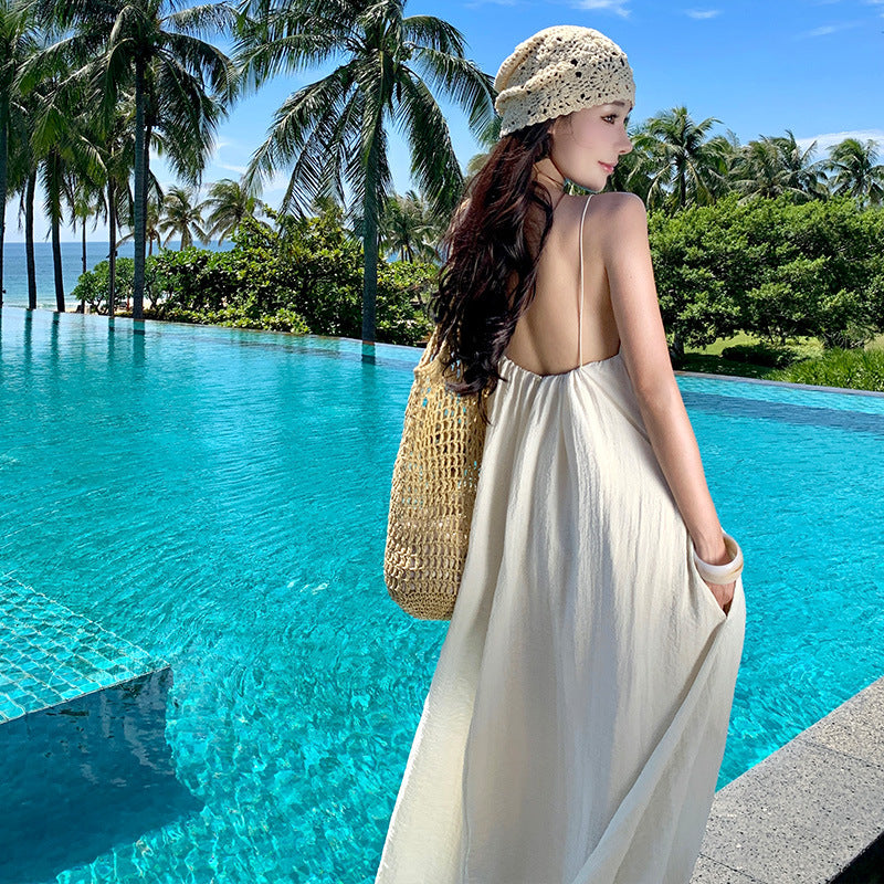 2025 Seaside vacation dress travel photo atmosphere lazy wind halter sling beach dress big swing skirt with chest pad