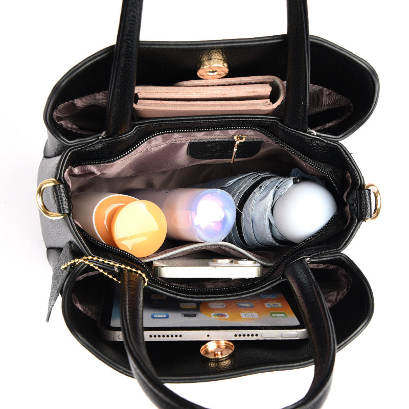 2025 Handbag spring fashionable simple bag multi-compartment large-capacity women's tote bag Korean version of the new commuter satchel