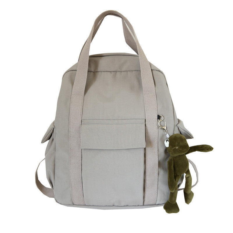 XIANGTUIBAO Solid Color Campus Schoolbag Men's and Women's Portable College Style Fashionable Simple Backpack Hong Kong Style Casual Backpack
