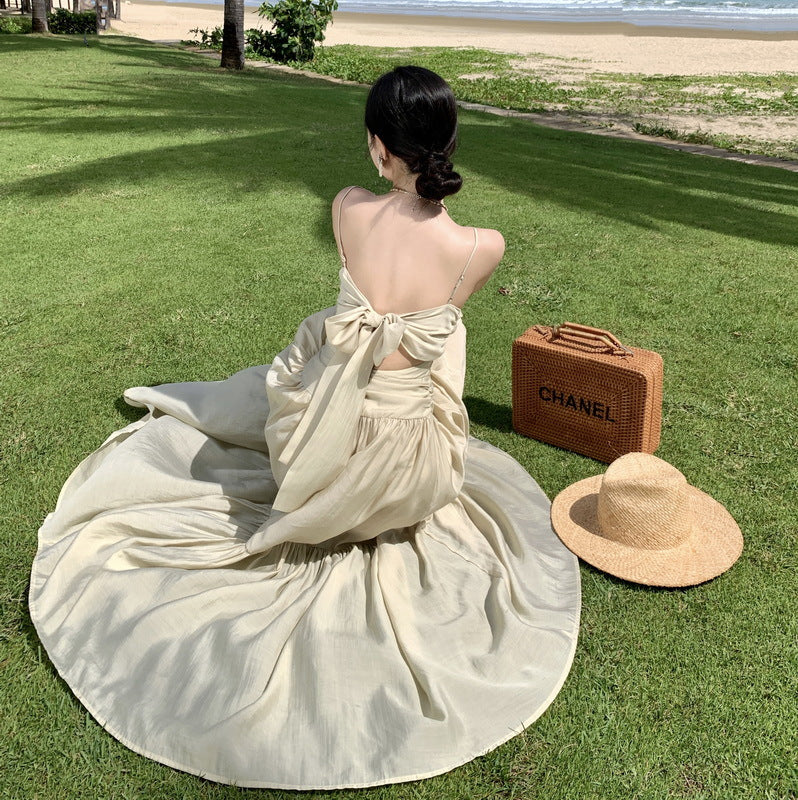 2025 Photo skirt Yunnan Xishuangbanna Dali long dress women's V-neck Hainan beach backless strap suspender dress