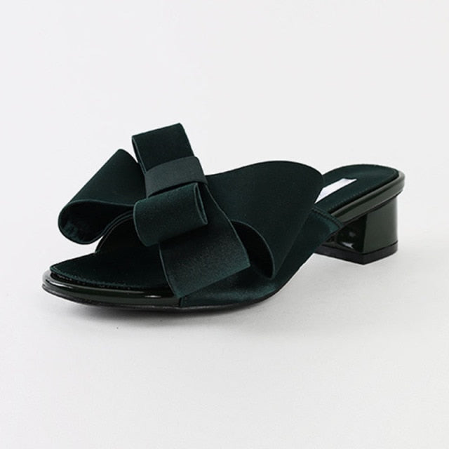 Wearing flat slippers women's shoes Korean version of the summer new large bow satin round head sandals Wild half slippers