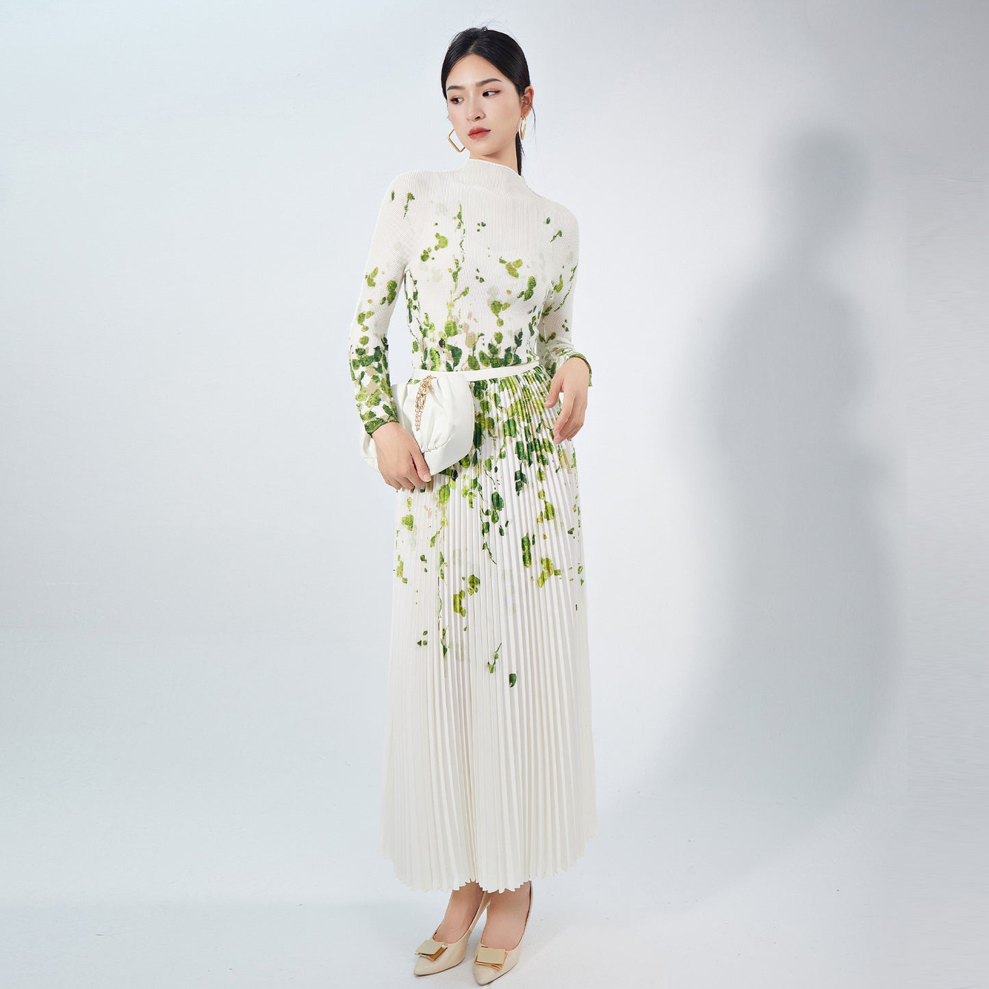 2025 Nanyou high-end women's clothing fashion pleated suit temperament slim-fit printed long-sleeved top A-word skirt two-piece set