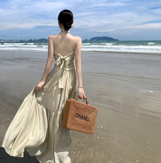 2025 Photo skirt Yunnan Xishuangbanna Dali long dress women's V-neck Hainan beach backless strap suspender dress