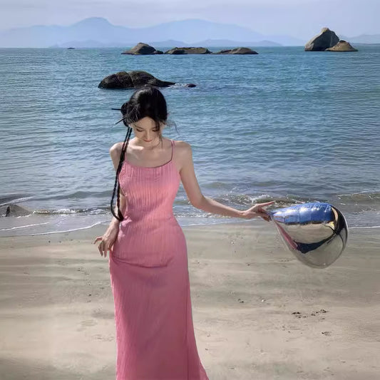 2025 Dopamine pink backless small suspender dress women's summer Thai style Dali Sanya seaside vacation beach long skirt