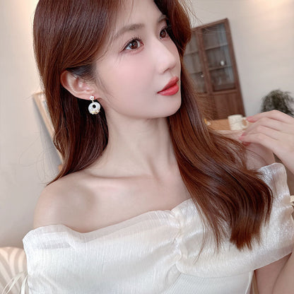 2025 New Chinese style earrings, pink flowers, elegant temperament, retro design, classical safety buckle, flower bird stud earrings.