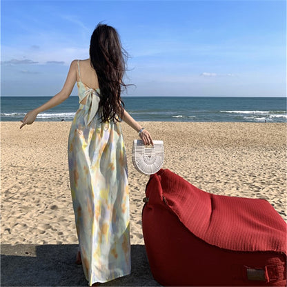 2025 Pure desire sexy backless floral suspender dress women's summer niche pleated straps seaside vacation beach dress