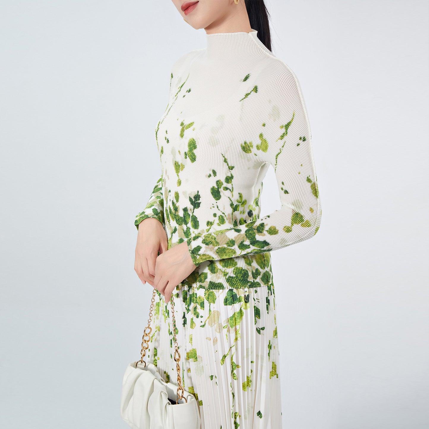 2025 Nanyou high-end women's clothing fashion pleated suit temperament slim-fit printed long-sleeved top A-word skirt two-piece set
