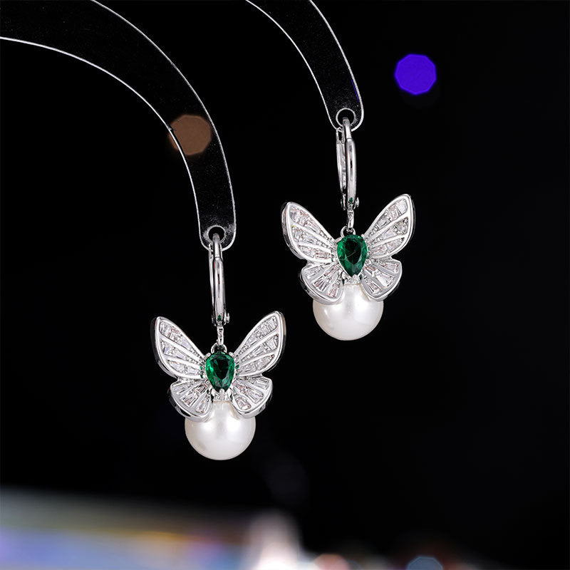 2025 fashion light luxury retro earrings slightly inlaid zircon personality versatile high-end earrings female butterfly pearl ear buckle