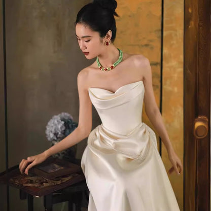 2025 one-word shoulder light wedding dress bride simple going out dress high-end temperament small trailing white satin dress skirt
