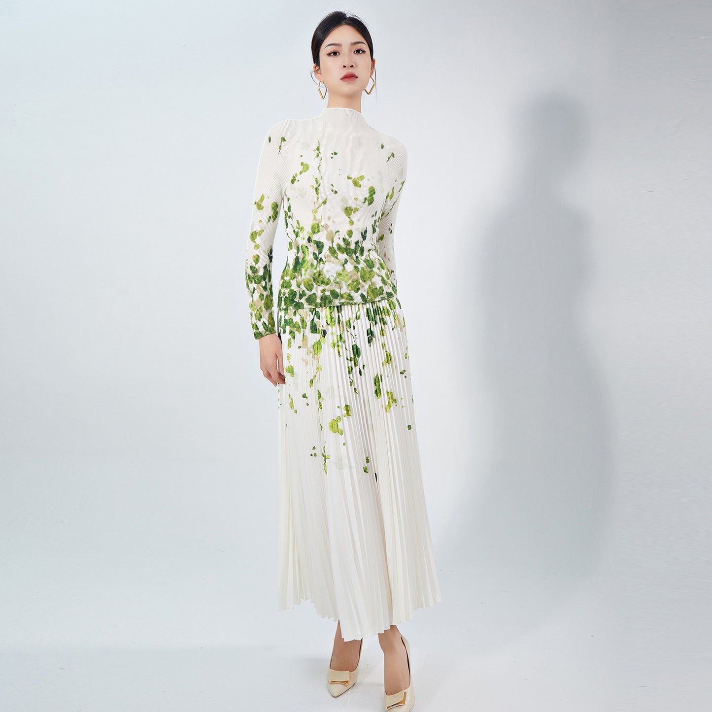 2025 Nanyou high-end women's clothing fashion pleated suit temperament slim-fit printed long-sleeved top A-word skirt two-piece set