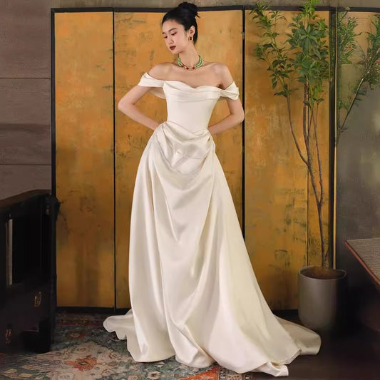 2025 one-word shoulder light wedding dress bride simple going out dress high-end temperament small trailing white satin dress skirt