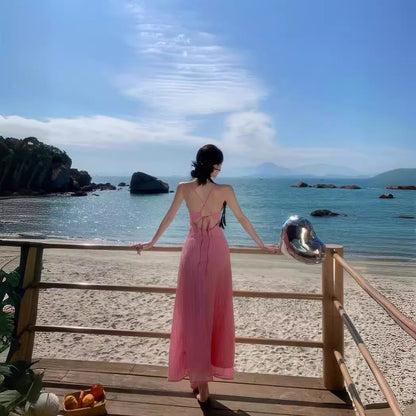 2025 Dopamine pink backless small suspender dress women's summer Thai style Dali Sanya seaside vacation beach long skirt