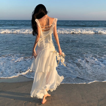 2025 gentle wind white suspender dress design sense niche vacation super fairy Mori swing collar split fork long dress
