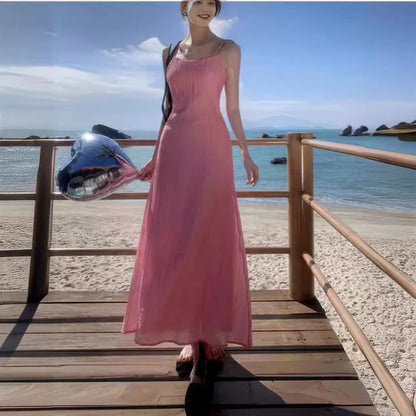 2025 Dopamine pink backless small suspender dress women's summer Thai style Dali Sanya seaside vacation beach long skirt